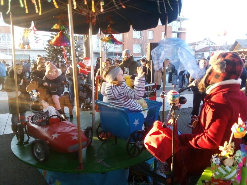 Le manège à pédales au Marché de Noël